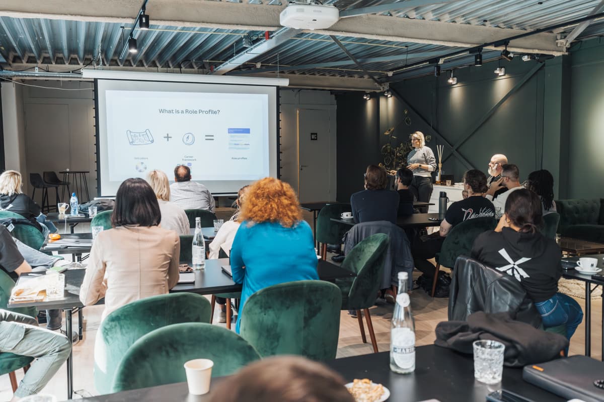 Consultant presenting strategy to client using projector